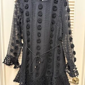 Elegant Black Mini Dress with Floral Accents